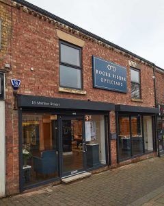 Roger Fisher Opticians, on Market Street in Marple